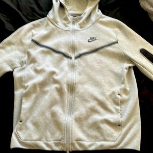 This is a Nike tech and it is fully in tact